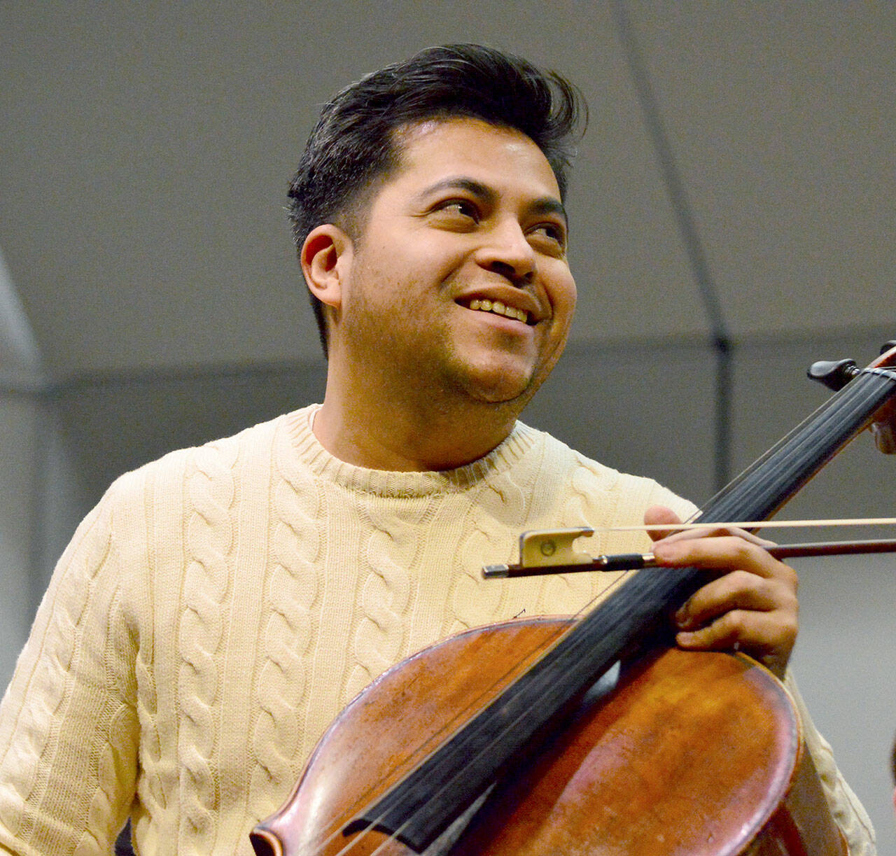 Cellist Gregorio Nieto, pictured rehearsing with the Port Angeles Symphony in December, will return for a gala concert with the orchestra March 15 at Field Arts & Events Hall. (Diane Urbani de la Paz/For Peninsula Daily News)