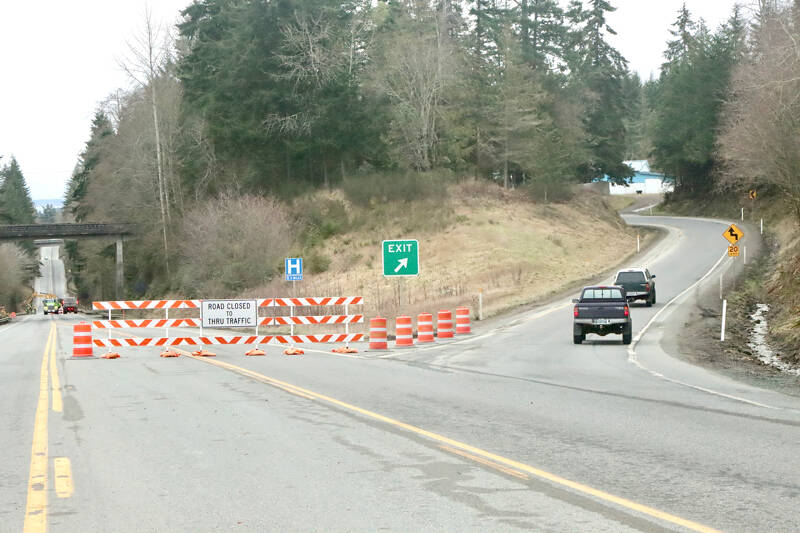 A portion of U.S. Highway 101 closed Monday for the next 80 days as crews work on culvert improvements. Heading east on Highway 101 just past Fairmount, traffic is diverted onto the Tumwater Truck Route to go through Port Angeles and connect back with Highway 101. (Dave Logan/for Peninsula Daily News)