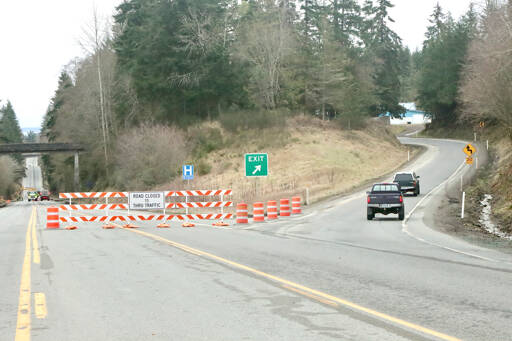 A portion of U.S. Highway 101 closed Monday for the next 80 days as crews work on culvert improvements. Heading east on Highway 101 just past Fairmount, traffic is diverted onto the Tumwater Truck Route to go through Port Angeles and connect back with Highway 101. (Dave Logan/for Peninsula Daily News)