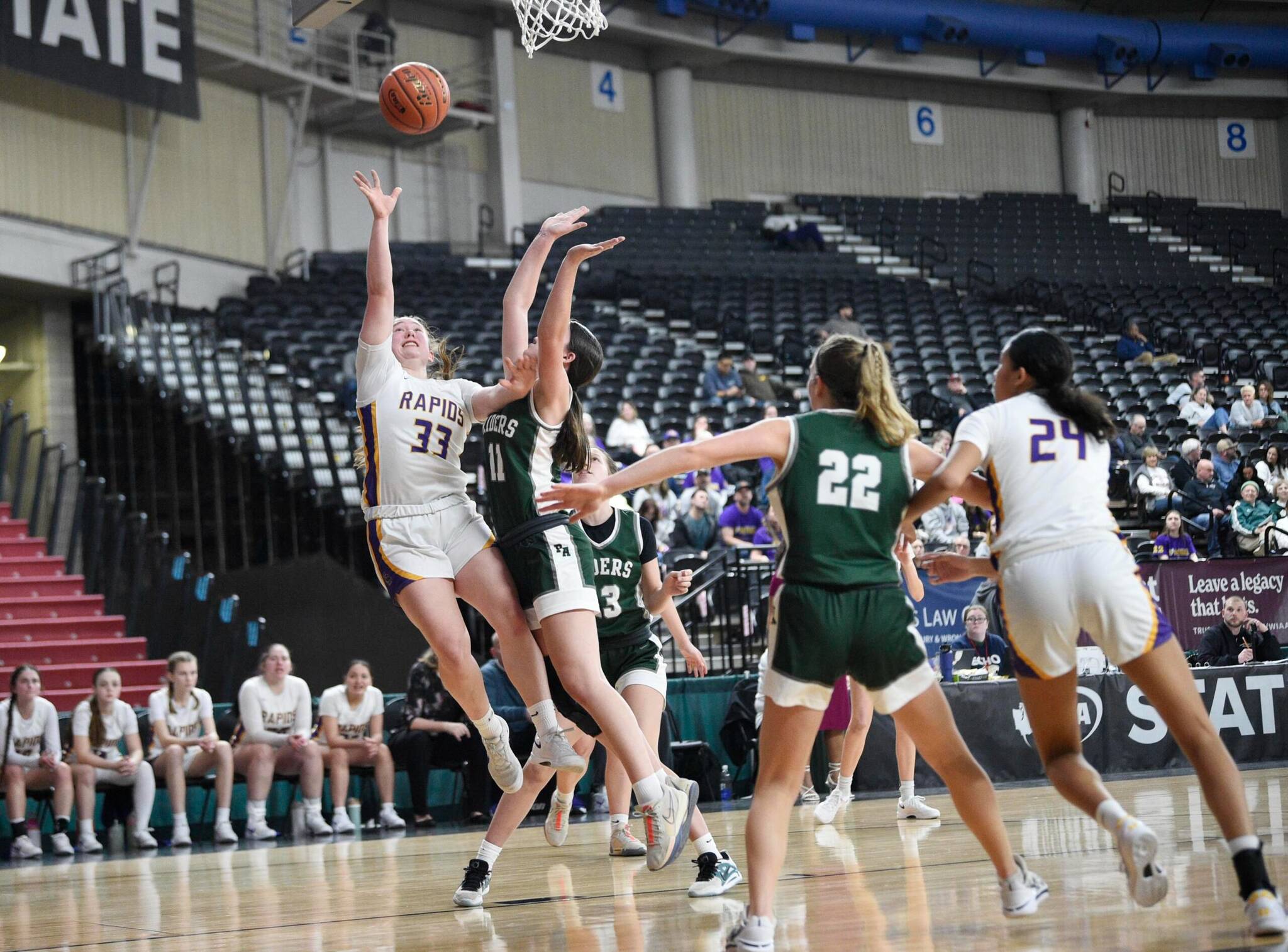 Will Denner/The Columbian
Columbia River’s Camy Drake (10) goes up for a shot against Port Angeles’ Lindsay Smith during a Class 2A girls basketball State Round of 12 game at the Yakima Valley SunDome.