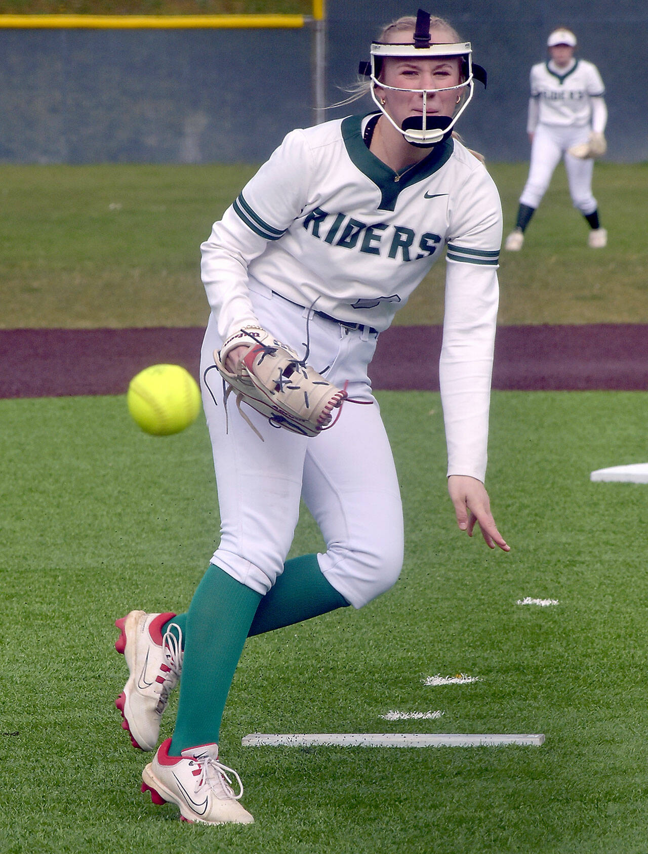 KEITH THORPE/PENINSULA DAILY NEWS Port Angeles pitcher Heidi Leitz throws in the first inning against Liberty on Friday at Volunteer Field.