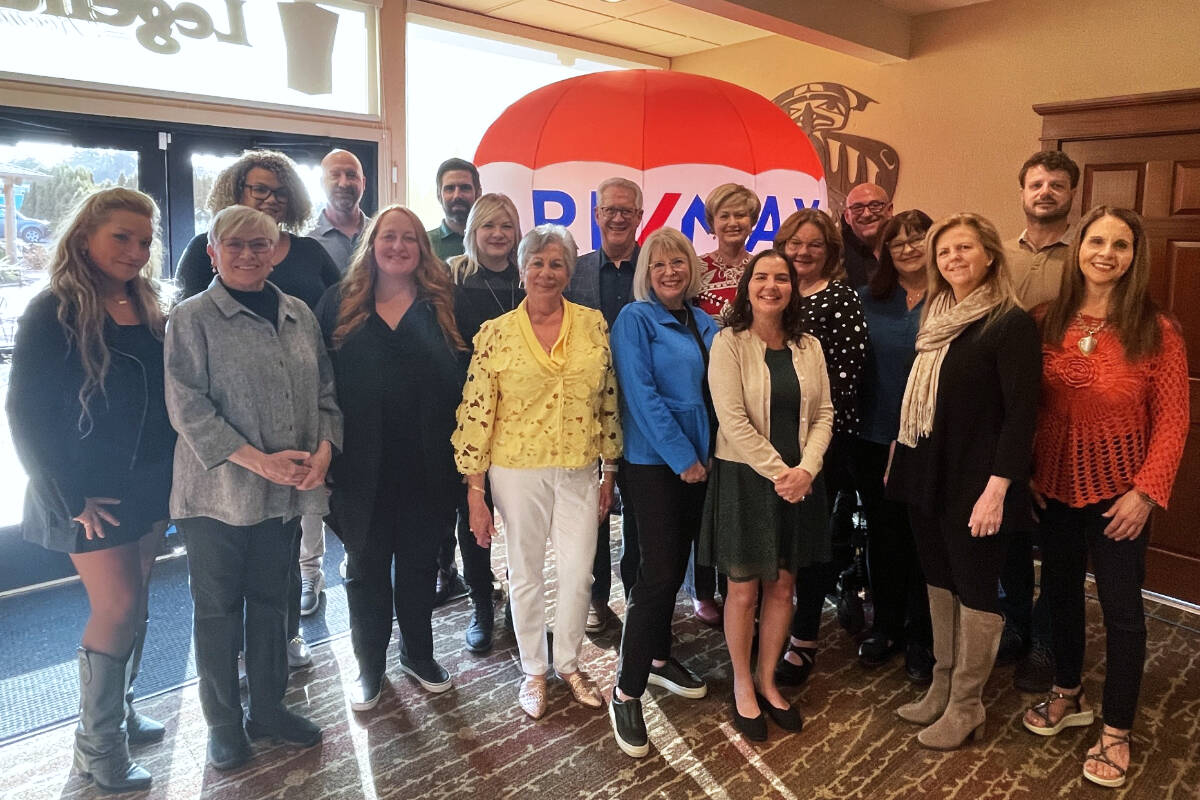 Since 2010, Liz Parks (in yellow) has built more than a real estate agency; she’s built a family. As she steps into retirement, RE/MAX Prime continues to thrive, guided by the same principles that made it a success.