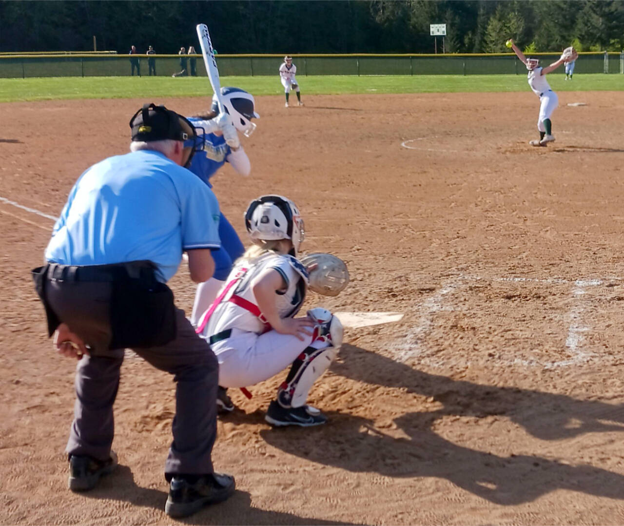 Port Angeles pitcher Lynzee Reid delivers a pitch to catcher Persephone Perry in Monday’s 17-0 victory over Bremerton. Reid and Heidi Leitz combined for a one-hitter, striking out nine in just five innings. (Pierre LaBossiere/Peninsula Daily News)