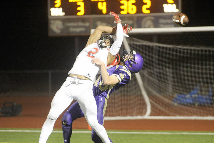 Sequim defensive back Jarrett Allen, right, defends against Steilacoom’s star receiver Emeka Egbuka in the second quarter of the Sentinels’ 49-12 Class 2A state tournament win in 2018 at Silverdale Stadium. (Michael Dashiell/Olympic Peninsula News Group)