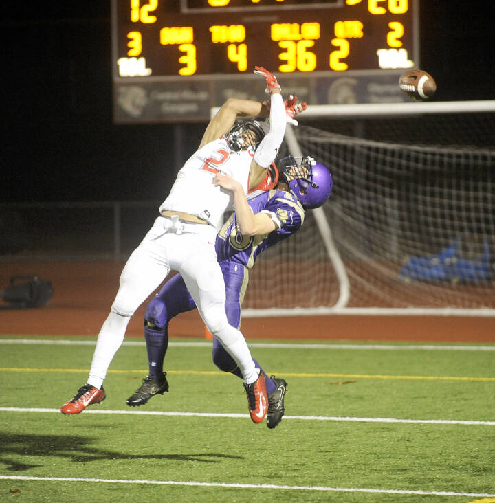 Sequim defensive back Jarrett Allen, right, defends against Steilacoom’s star receiver Emeka Egbuka in the second quarter of the Sentinels’ 49-12 Class 2A state tournament win in 2018 at Silverdale Stadium. (Michael Dashiell/Olympic Peninsula News Group)