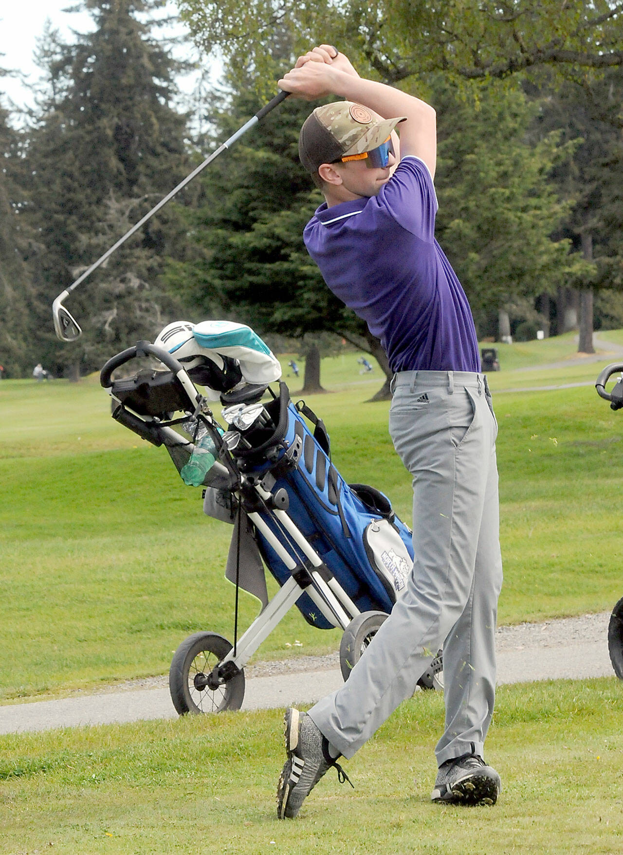 KEITH THORPE/PENINSULA DAILY NEWS Sequim’s Levi Breithaupt takes a tee-off shot during Friday’s Duke Streeter Invitational at Peninsula Golf Club in Port Angeles.