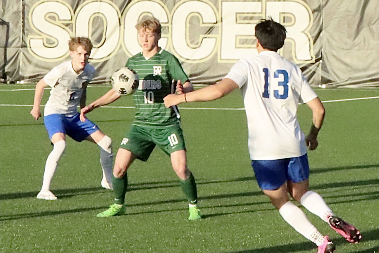 Port Angeles’ Matthew Miller settles the ball against Bremerton on Tuesday at Wally Sigmar Field in Port Angeles. Miller scored a hat trick, his third of the season, as the Roughriders won 4-0 to lock up third place in the Olympic League. Port Angeles will host a district playoff game Saturday. (Dave Logan/for Peninsula Daily News)