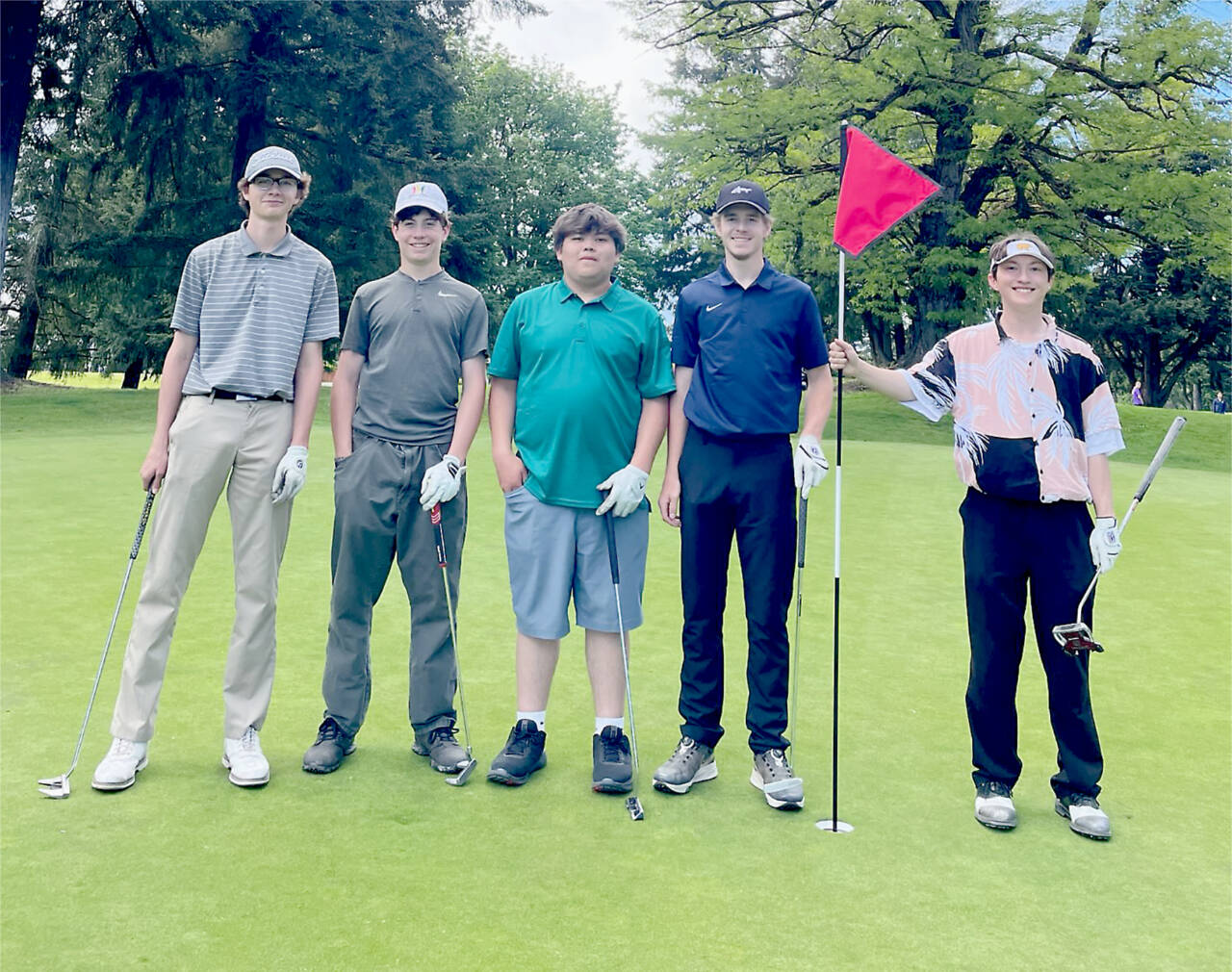 The Port Angeles boys golf team members who qualified for either district or state. From left, Noah Myers, Sky Gelder, Kolby Charles, Austin Worthington and Cale Wentz. Worthington and Wentz will be moving on to play in the state tournament next week, joined by three Port Angeles girls and three golfers from Sequim. (Bob Anderson)