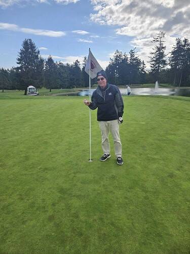The Cedars at Dungeness Men’s Club member Michael “Burch” Burchard aced the par-3 No. 8 hole from 100 yards with his pitching wedge on Monday. It was his first career hole-in-one. (The Cedars at Dungeness)