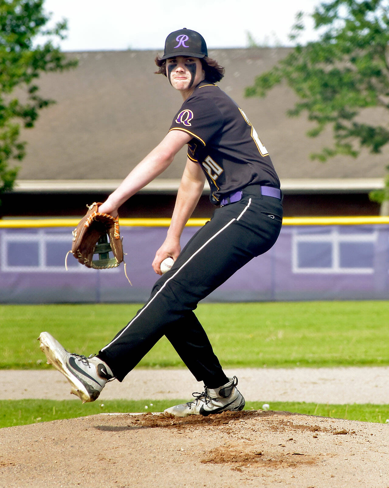 KEITH THORPE/PENINSULA DAILY NEWS Quilcene pitcher Eli Allen throws in the first inning against Wahkiakum during Wednesday’s playoff game in Sequim.
