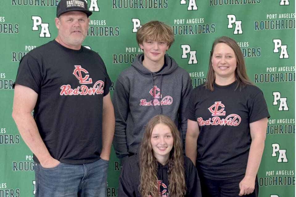 Port Angeles’ Zoe Ernst signs to play soccer for Lower Columbia College surrounded by her, from left, father Jaxon Ernst, brother Clayton Ernst and mother Emily Ernst. (Port Angeles High School)