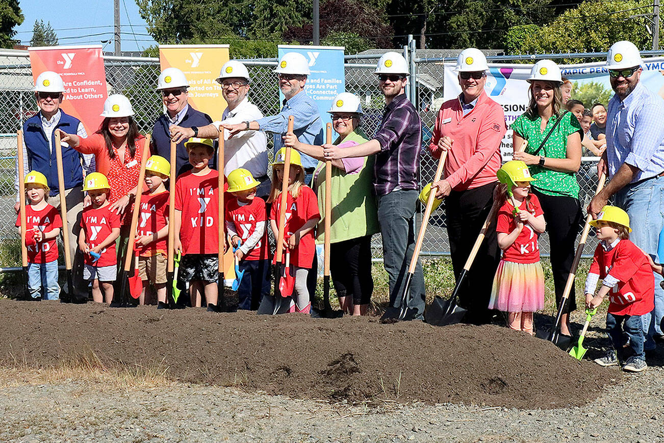 Wendy Bart, the CEO of the Olympic Peninsula YMCA was the MC at a Ground Breaking Ceremony Wed afternoon. The new Early Learning Center (child care) is to be built in the area just west of the YMCA's current parking lot off Francis Street.  Over 40 dignitaries and interested people came for the introduction and the ground breaking photo op. Bart in her opening remarks said the idea for the project was formed during COVID when they realized the Olympic Peninsula was a “child care desert”. Soon was formed the money raising and architectural drawings. “The people of the Olympic Peninsula are magical” when explaining that $7 million of the needed $9 million have been promised. “We have a trajectory for success from a caring community” she continued. The 8000 sq foot building will break ground next month with a finish date of opening in September of 2026. The facility designed for children under age 5 will have hours of 6:30 AM to 6:30 PM. The general contractors is G.L.Y. of Bellevue. WA.
        Ground Breaking Op — L to R are Randy Johnson, Virginia O’Neil, Steve Tharinger, Mike French, Mark Ozias,  LaTrisha Suggs, Drew Schwab, Glenn Smithson, Lori Robbin, John Vorhees,  And a host of “special guests” who perhaps will get to use the new facility when opened.                                  (call Jody Minker for more info at 360-301-3221) dlogan