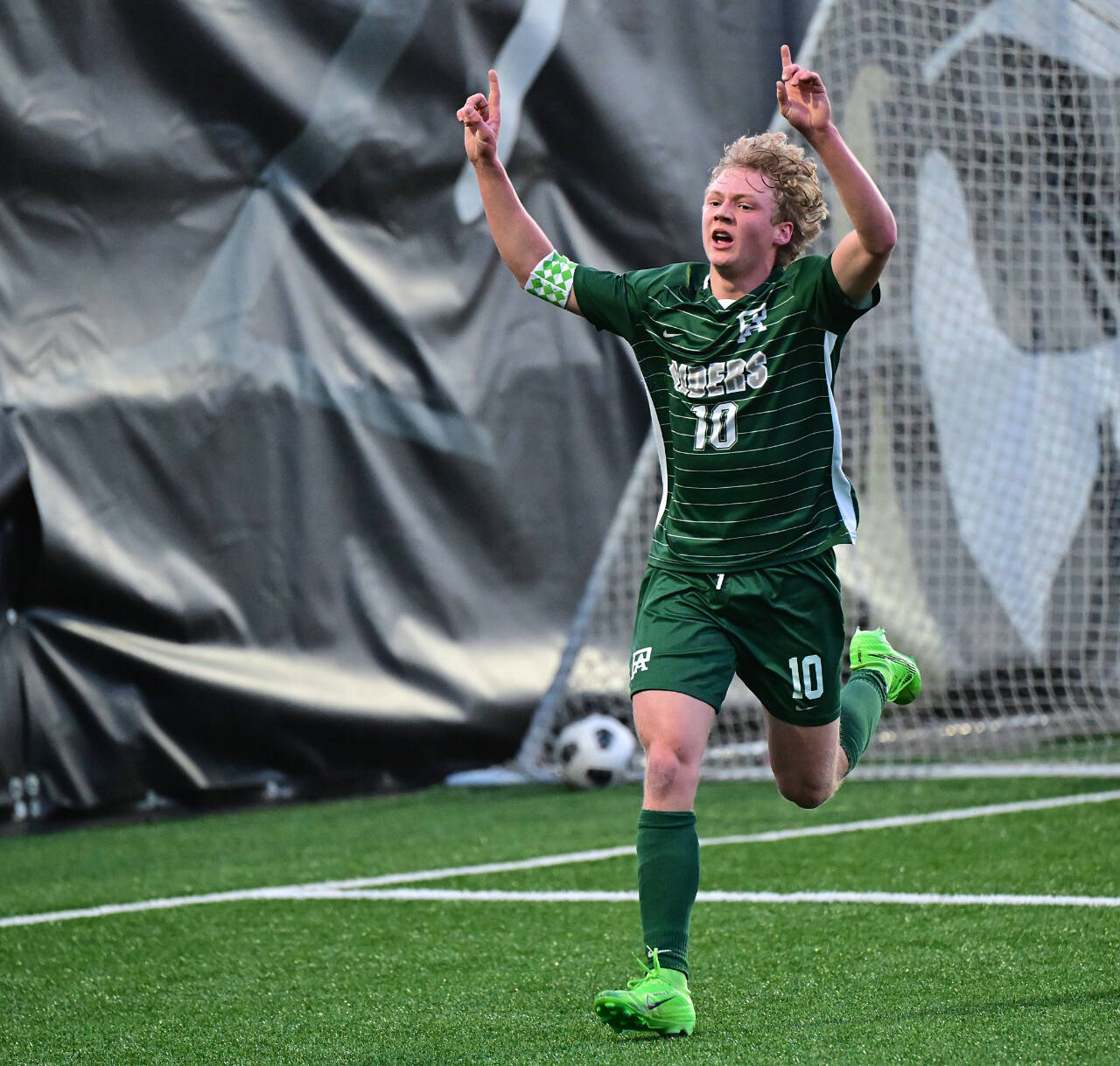 Port Angeles’ Matthew Miller celebrates one of his 22 goals this season for the Roughriders. (Jay Cline)