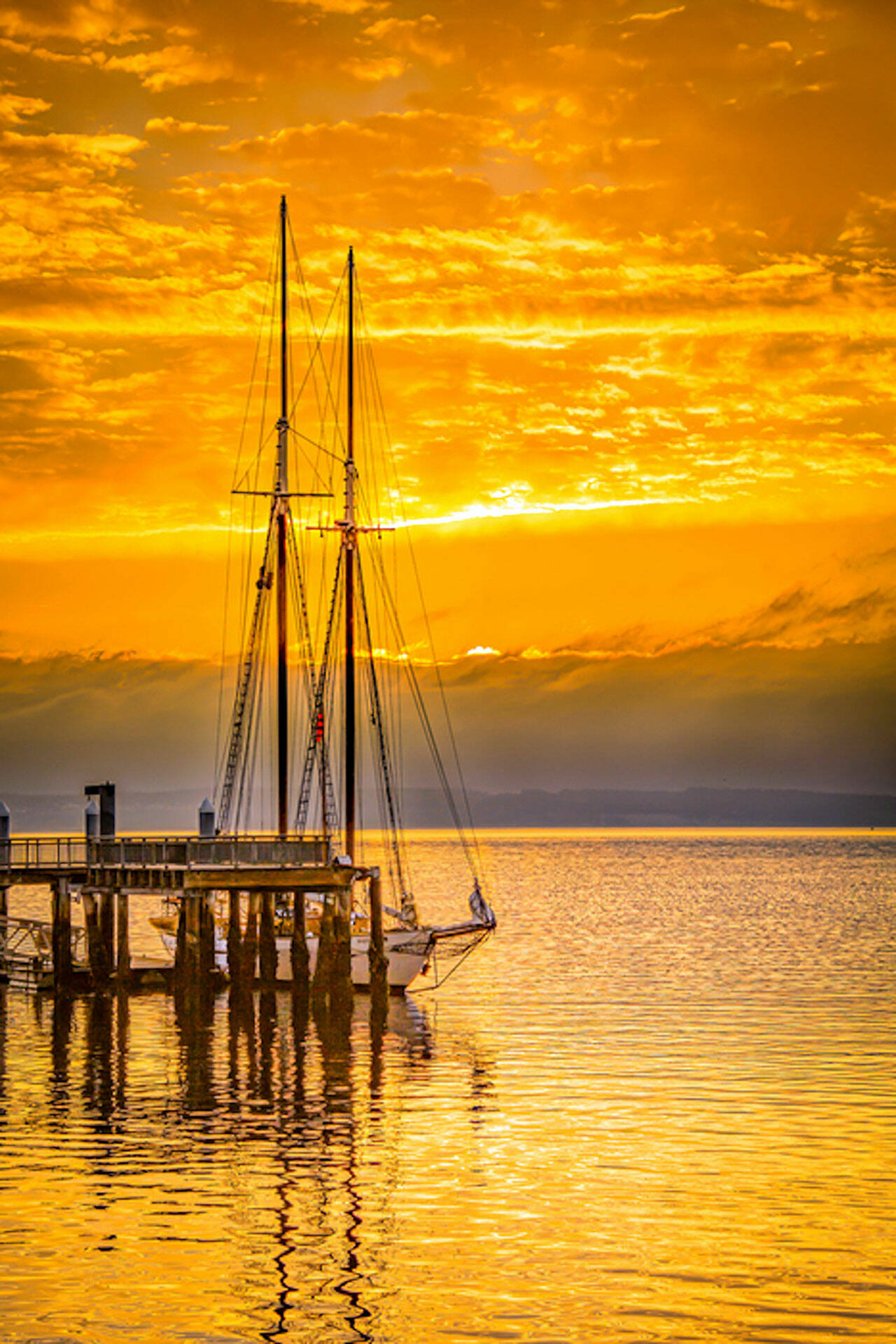 “Adventuress Sunrise” by Mitchel Osborne is one of more than 50 artworks in Northwind Art’s online auction starting Monday. A pop-up gallery with all of the works on display is set for Tuesday and June 11 at the Cotton Building in Port Townsend. (Mitchel Osborne)