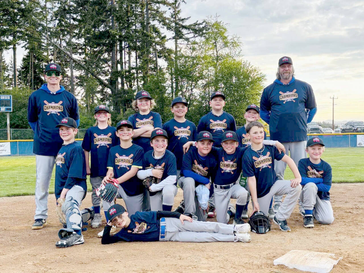 The Rotary Club team won this weekend’s North Olympic Baseball and Softball baseball championship for the U12 Majors 46/60 league. From left, back row are coach Joel Wood, Skyler Neitzel, Bjorn Rose, Sawyer Almond, Gabriel Money, Joshua Shiepko and Coach Simon Money. From left, borrow row, are Gabriel Shiepko, Steven Torres, Samuel Jones, Jace Baker, August Jones, Raylan Gear and Damien Millet. Lying sideways is Reed Lancaster.