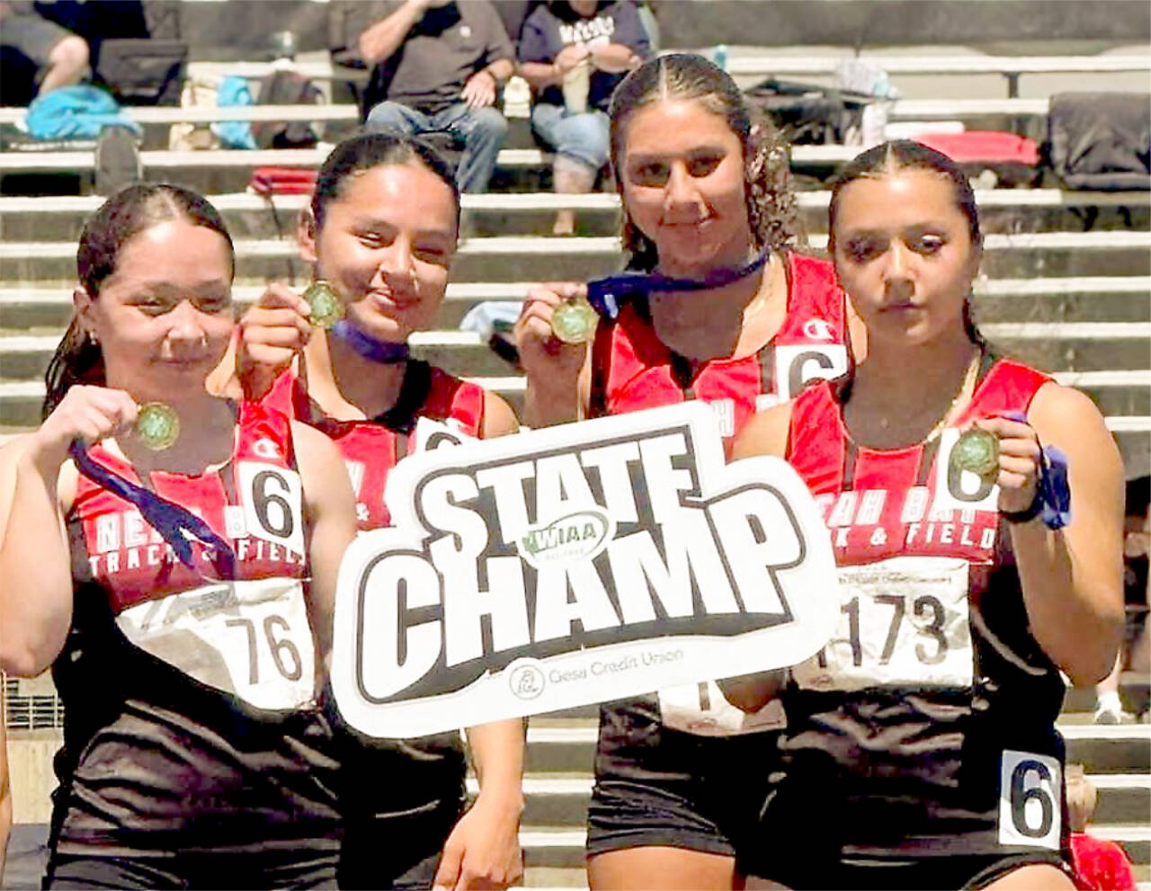 The Neah Bay state champion 4x100 and 4x200 team. From left, Brianna McGimpsey, Alexa Greene, Angel Halttunen and Qwaapeys Greene.