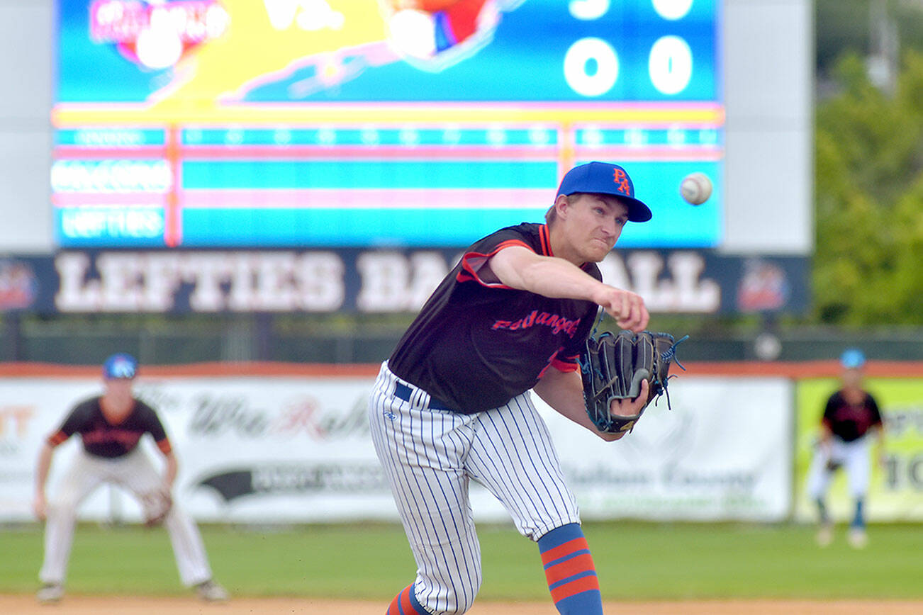 KEITH THORPE/PENINSULA DAILY NEWS
Leftiies pitcher Liam Karson throws in the first inning against Kelowna on Thursday at Port Angeles Civic Field.