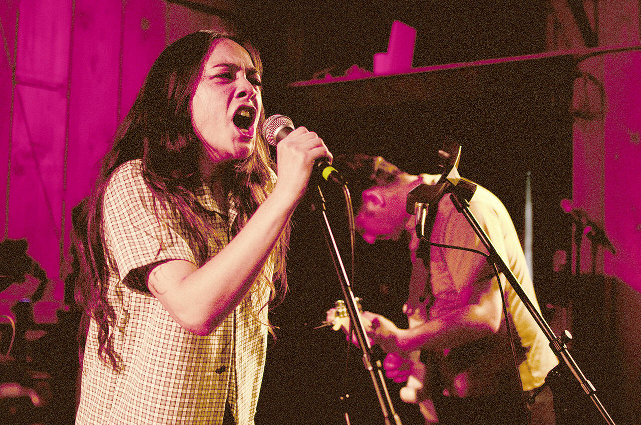 Helen and Richard “Rico” Vinh of the band Pistil play onstage at the first Tarboo Fest on July 4, 2024. (Elijah Sussman/Peninsula Daily News)