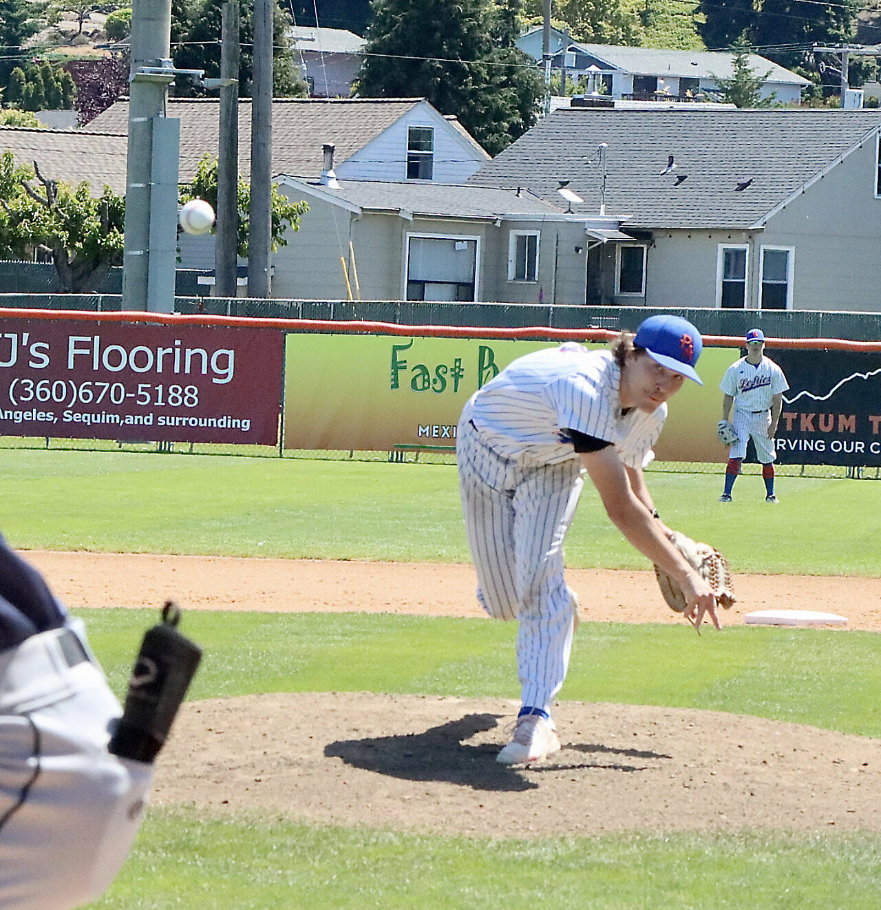 Port Angeles Lefties starter Brad Johnson delivers a pitch to the plate Sunday at Civic Field. Johnson went four innings and allowed just one hit in the Lefties’ fifth-straight victory. (Dave Logan/for Peninsula Daily News)