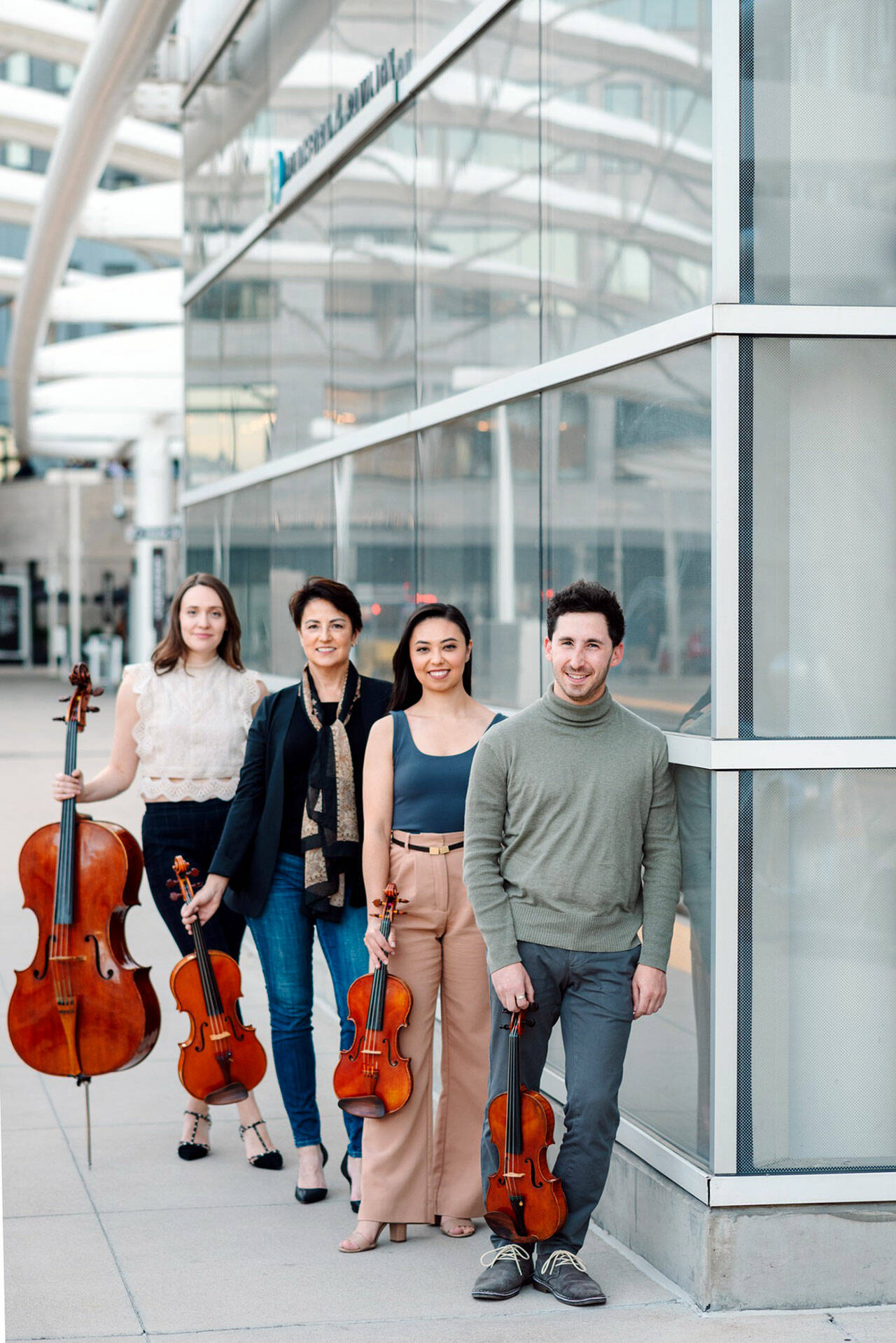 The Carpe Diem String Quartet, from left, cellist Ariana Nelson, violist Korine Fujiwara and violinists Marisa Ishikawa and Sam Weiser, will open the eighth season of Concerts in the Barn this weekend.