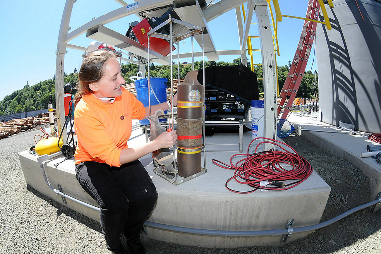 KEITH THORPE/PENINSULA DAILY NEWS
Oceanographer Mallory Ringham makes adjustments on a carbon dioxide sensor that will be deployed in Port Angeles Harbor.