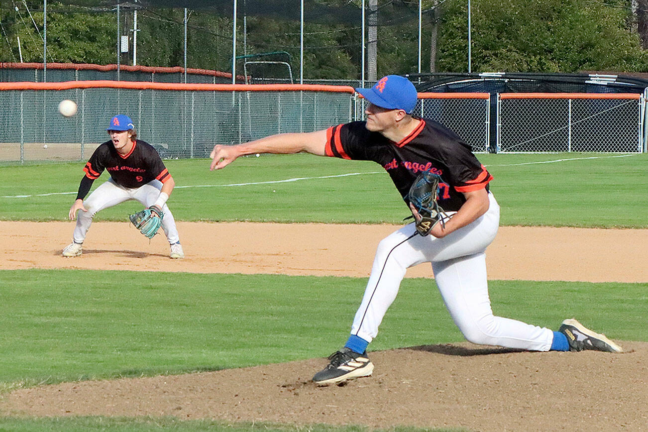 Dave Logan/for Peninsula Daily News
Port Angeles starting pitcher Liam Karlson delivers a pitch during Wednesday night's contest with the Victoria HarbourCats at Civic Field.