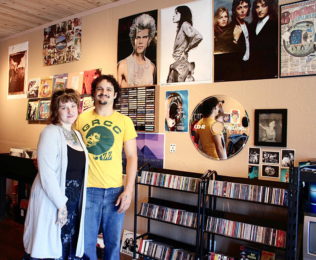 Tayler Bulus-Steed and Mayah Simpson-Thompson, founders of Funky Grooves, showcase their newly opened record shop, where they have curated a space dedicated to music, community and vintage culture. (Allora Walls/Peninsula Daily News)