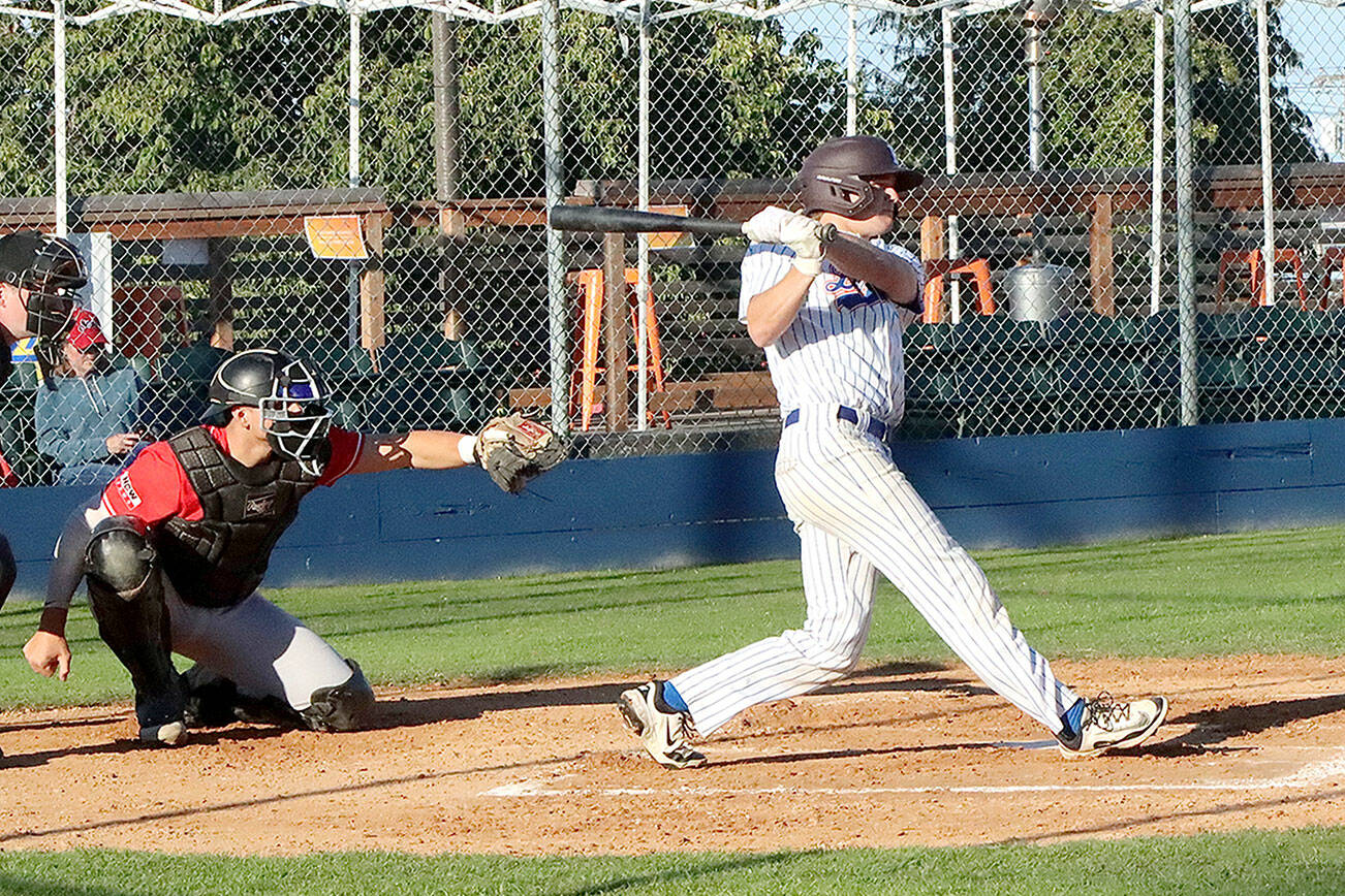 Dave Logan/for Peninsula Daily News
Lefties WCL All-Star Tommy Markey swings at pitch against the Wenatchee AppleSox at Civic Field on Monday. Markey had a single and run scored in the Lefties' 5-2 loss.