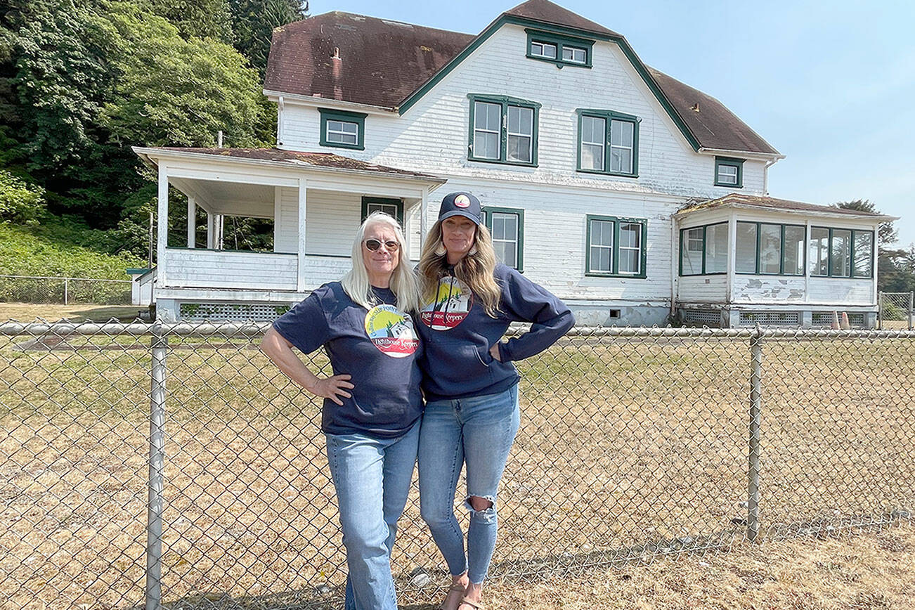 Mother and daughter Susan Heiny, left, and Sarah Winter Grafstrom with the Slip Point Lighthouse Keepers are working to preserve the 1905 keeper’s house, which is on the National Register of Historic Places. The 10-acre property will be conveyed to Clallam County from the U.S. Coast Guard for use as a park after remediation at the site is completed. The lighthouse no longer exists. (Paula Hunt/Peninsula Daily News)