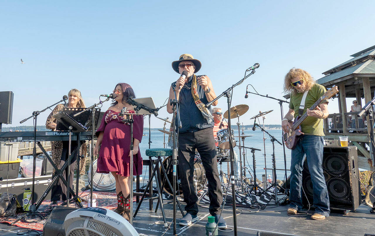Port Townsend’s Kevin Mason, center, and the PT All Stars perform the last Concerts on the Dock set for the season on Thursday at Pope Marine Park in Port Townsend. (Steve Mullensky/for Peninsula Daily News)