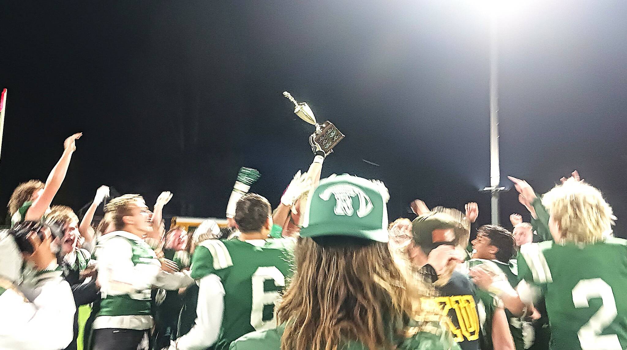 The Port Angeles Roughriders celebrate their 27-14 win over the Sequim Wolves Friday night at Civic Field in Port Angeles. More details online to come on the game. (Pierre LaBossiere/Peninsula Daily News)