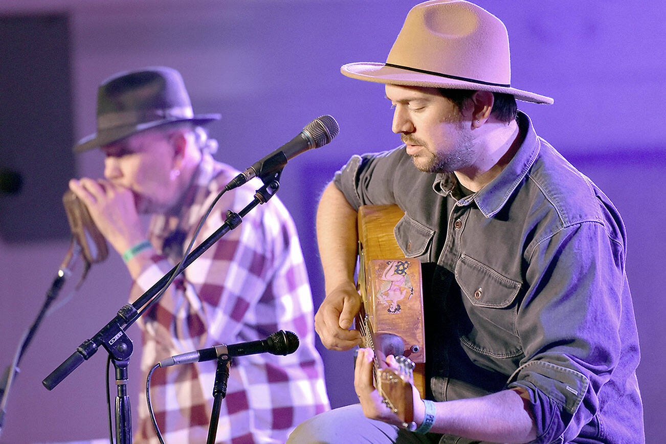 David Jacobs-Strain of Eugene, Ore., right, and Bob Beach of Pittsburgh, Pa.,perform on the Main Stage at the 2024 Juan de Fuca Festival of the Arts. (Keith Thorpe/Peninsula Daily News)