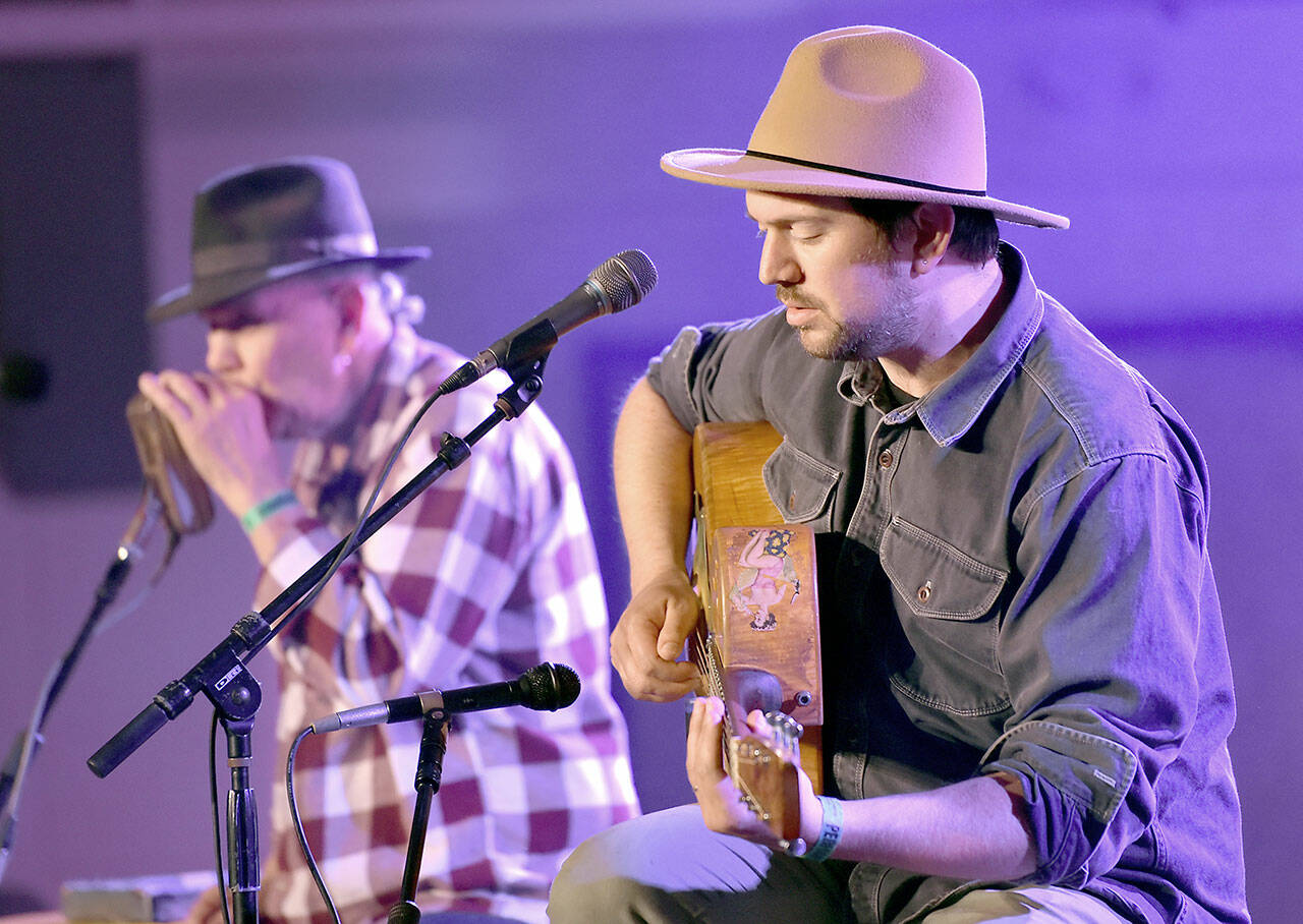 David Jacobs-Strain of Eugene, Ore., right, and Bob Beach of Pittsburgh, Pa.,perform on the Main Stage at the 2024 Juan de Fuca Festival of the Arts. (Keith Thorpe/Peninsula Daily News)