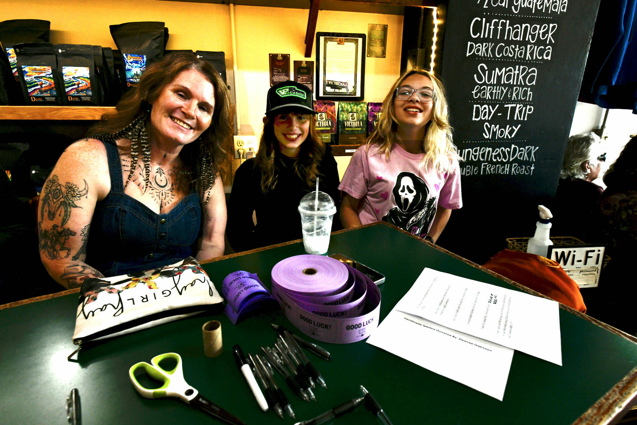 Jennifer Hanshaw, left, her daughter Ember, center, and friend Skyler Adair enjoy cream sodas during a fundraiser for the Hanshaw family at Rainshadow Cafe on Sept. 27. 
Jacque Star/Olympic 
Peninsula News Group