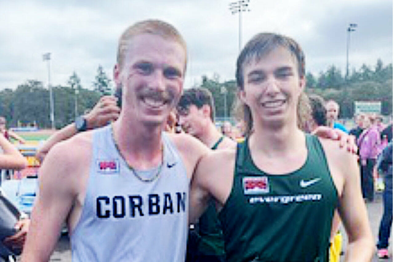 Corban University’s Jack Gladfelter, left and The Evergreen State College’s Max Baeder, right, after competing in the Charles Bowles Cross-Country Invitational in Salem, Ore., last week. (Joe Gladfelter)