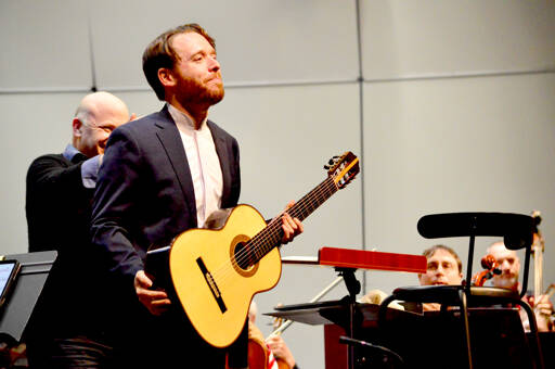 Guest soloist Colin Davin, rehearsing with the Port Angeles Symphony in 2023, will return to the Peninsula for solo recitals in Port Angeles on Friday and in Sequim on Saturday. (Diane Urbani de la Paz)