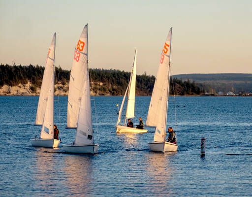 A sailing class practices boat-handling skills on Port Townsend Bay. (Steve Mullensky/for Peninsula Daily News)