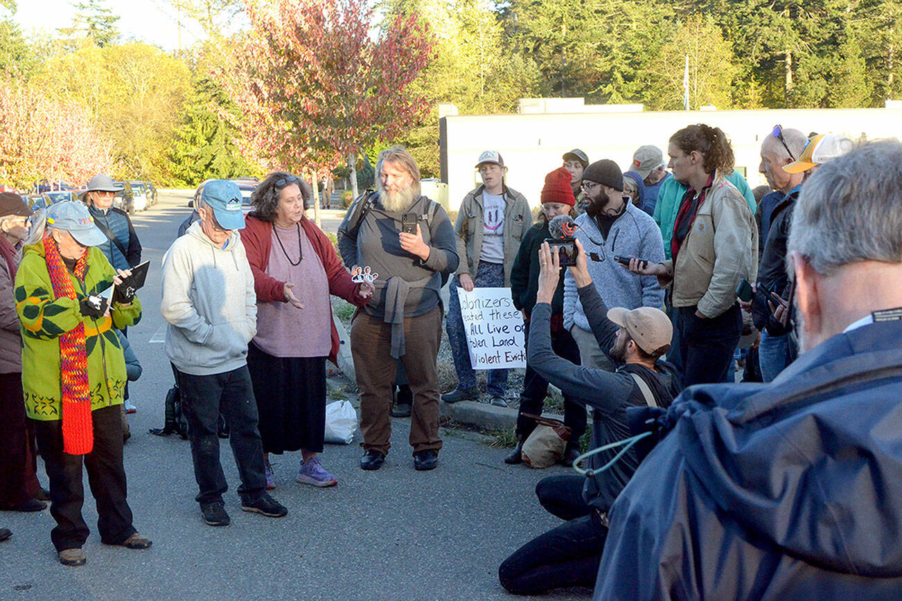 The first half of a special Port Townsend City Council meeting took place Monday afternoon at the cul de sac at the end of Evans Vista, near the homeless encampment scheduled for removal on Monday. (Elijah Sussman/Peninsula Daily News)