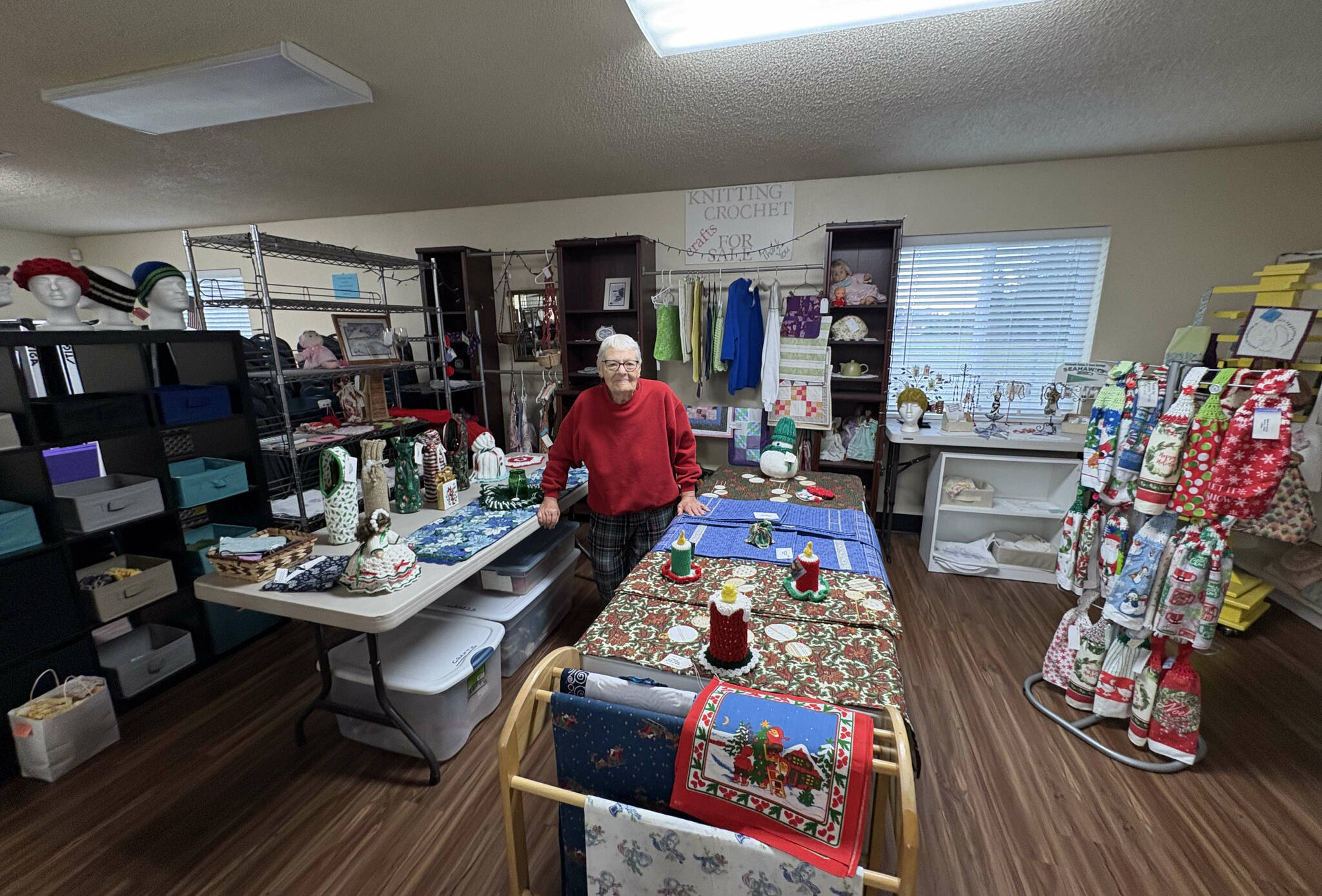 Reba Renner
Judy Lange stands in the craft store at the Shipley Center amid items made by the fiber arts group she leads. Items from the store will be sold at the Shipley Center Holiday Bazaar scheduled for Friday and Saturday.
