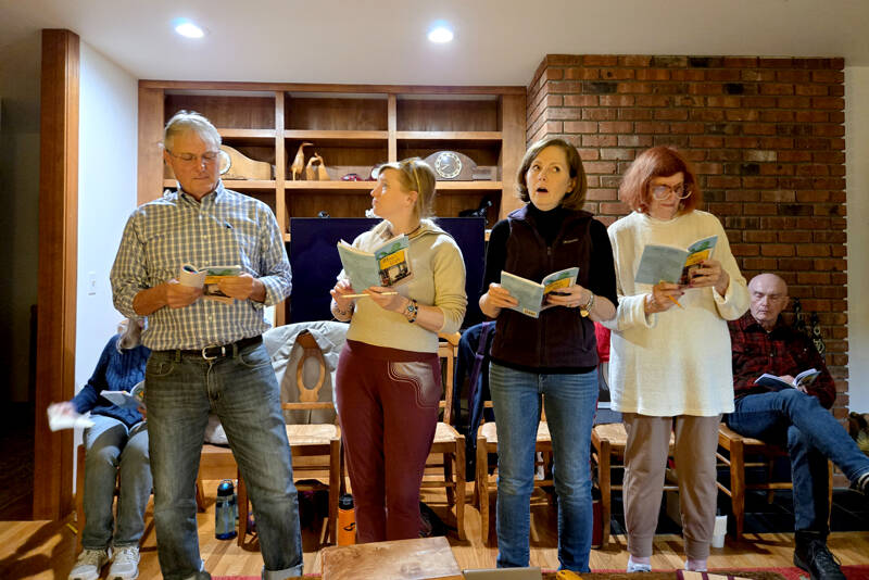 Ludlow Village Players, from left, Kim DeRidder as Dad, Jenna Welch as Brittney, Christie Lang as Kat, Susan Abrahamson as Mom and Glenn Gilbert, seated, as Kevin, during a rehearsal for “Mom’s Gift.”