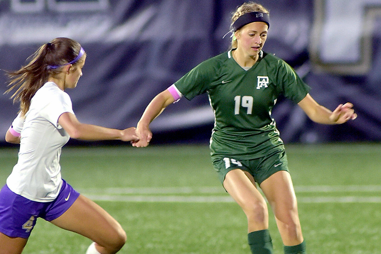 KEITH THORPE/PENINSULA DAILY NEWS Port Angeles’ Becca Manson, right, works to keep control as Sequim’s Raimey Brewer approaches in midfield on Thursday at Wally Sigmar Field.
KEITH THORPE/PENINSULA DAILY NEWS Port Angeles’ Becca Manson, right, works to keep control as Sequim’s Raimey Brewer approaches in midfield on Thursday at Wally Sigmar Field.