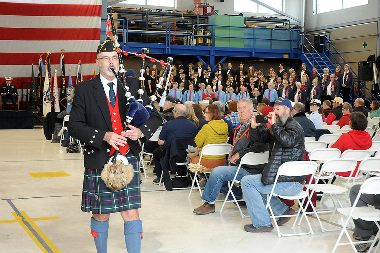 Bagpiper Rick McKenzie, who performed “Amazing Grace” during the 2023 regional Veterans Day ceremony in the hanger at U.S. Coast Guard Air Station/Sector Field Office Port Angeles, is scheduled to perform at this year’s ceremony, which will be held at the Port Angeles High School auditorium due to the federal government shutdown. (Keith Thorpe/Peninsula Daily News)