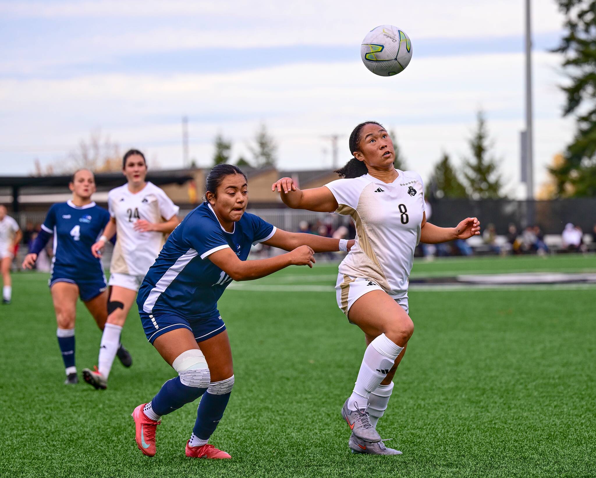 ISIS-Jade Bryant (8) corrals a loose ball against Columbia Basin College at Wally Sigmar Field on Sunday. The Pirates won 2-0 to advance to the NWAC Final Four. In the background is Peninsula’s Elise Maffeo (24). (Jay Cline/Peninsula College)