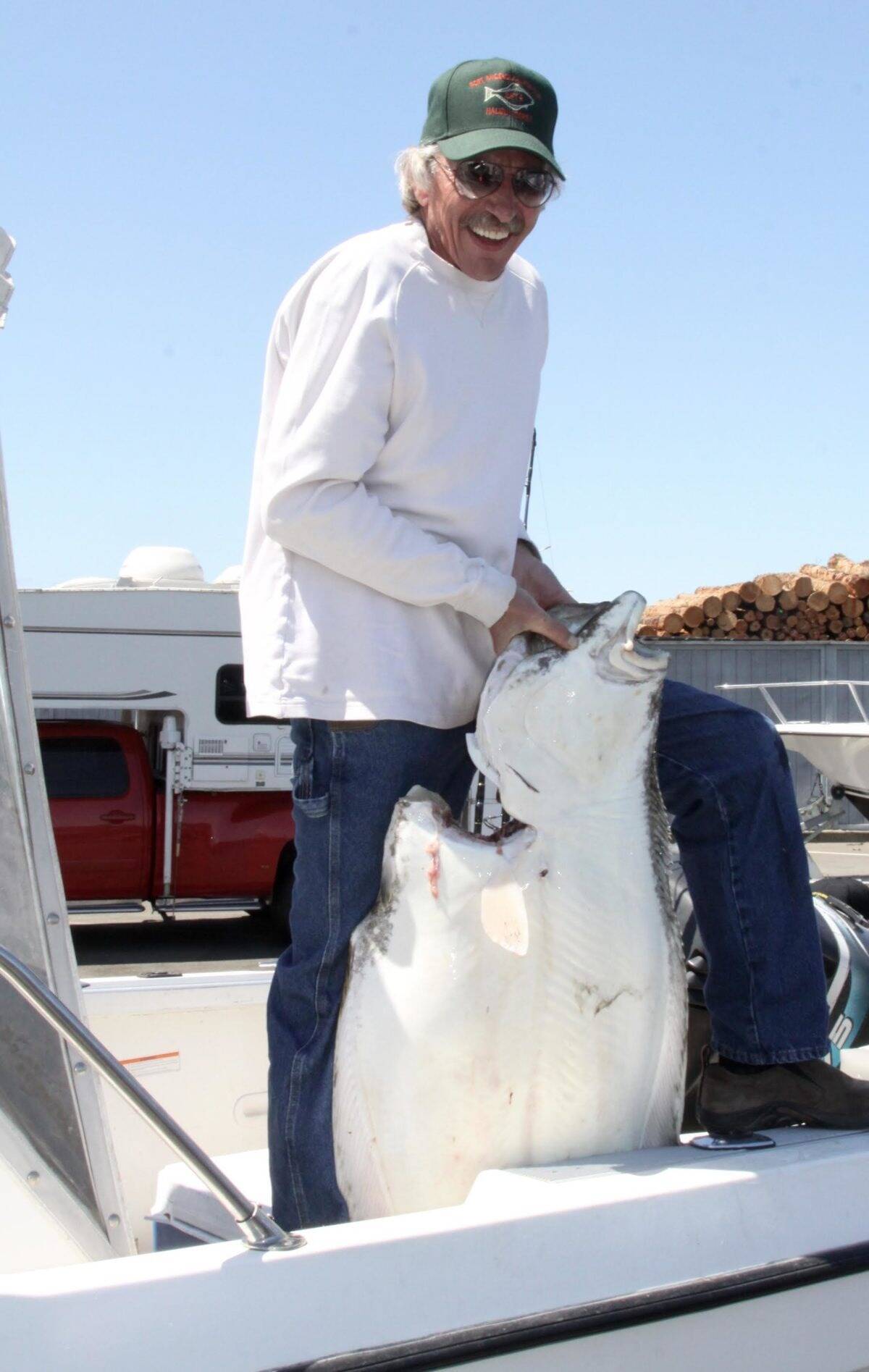 Port Angeles’ Kenny Riggs caught this 78.7-pound halibut on the final day of the 2016 Port Angeles Salmon Club Halibut Derby to win the $5,000 first prize. This was the last halibut derby held by the club due to reduced halibut seasons.