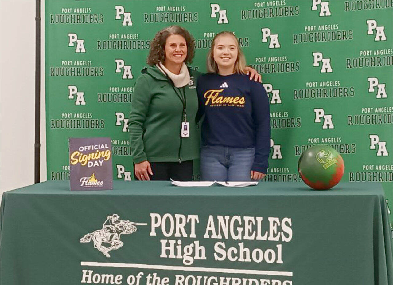 Port Angeles bowler Zoey Van Gordon with her coach Becky Gundersen, left, signed to compete at the College of Saint Mary in Omaha, Neb. (Pierre LaBossiere/Peninsula Daily News)