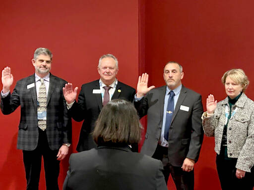 Clallam County Commissioner Mark Ozias, left, has been elected to serve as president of the Washington State Association of Counties for the coming year.
