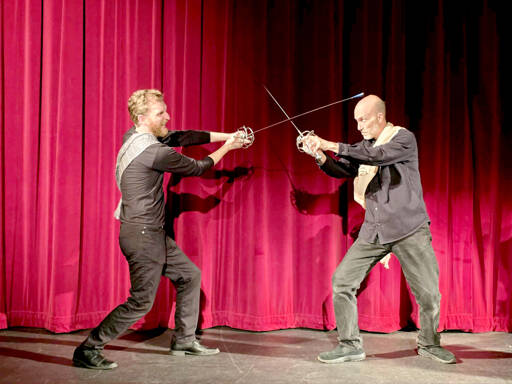 Matt Forrest, left, as MacDuff and Tim Thorn as Macbeth rehearse for Peninsula College’s production of “Macbeth or The Curse of the Scottish Play.”
