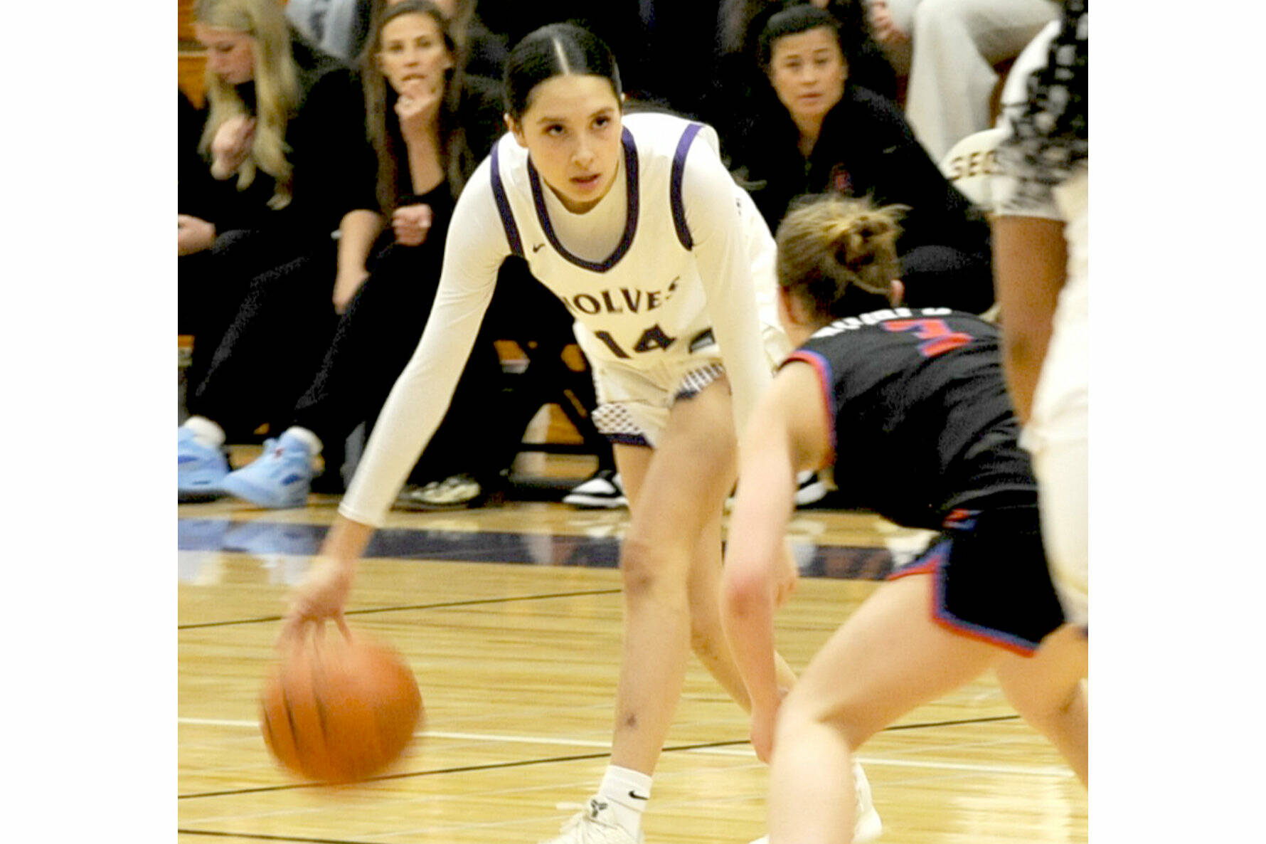 Sequim's Gracie Chartaw scored 30 points in a season-opening win over East Jefferson on Tuesday. Here, she is guarded by East Jefferson's Kaydence Plotner. (Matthew Nash/Olympic Peninsula News Group)