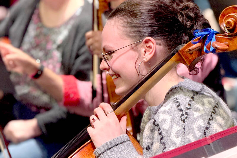 Cellist Joanna Minnoch, shown in rehearsal, is among the 75 Port Angeles Symphony musicians preparing for Saturday’s Holiday Concert. (Diane Urbani de la Paz/For Peninsula Daily News)
