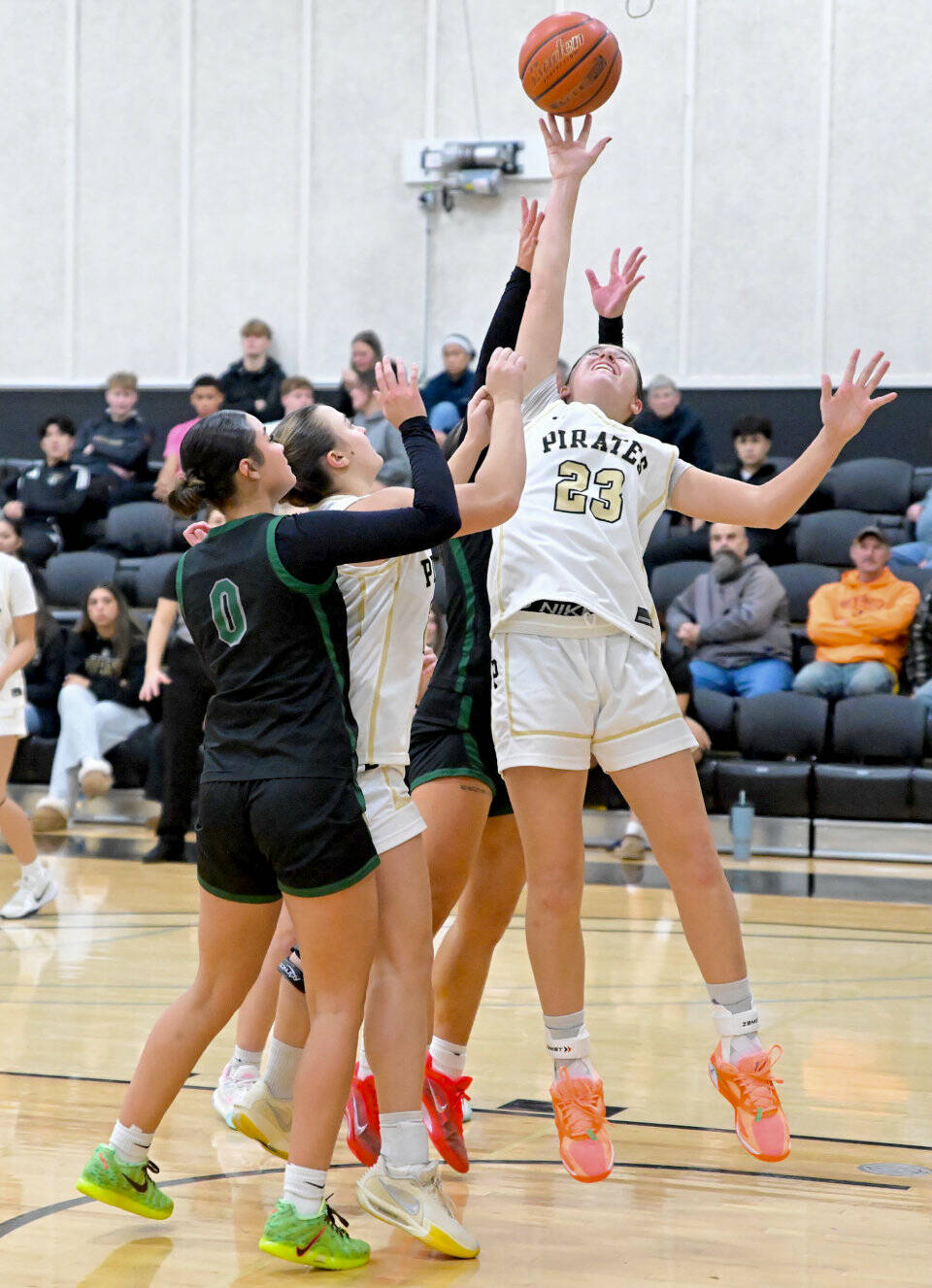 Jay Cline/Peninsula College
Peninsula College’s Aspen Fraser battles for a rebound against Chemeketa on Friday night. Fraser has 12 points and 12 rebounds as the Pirates won 80-62.